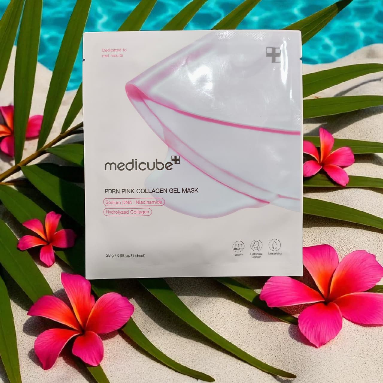 Medicube pink collagen gel mask packaging with flowers and leaves on a bright background